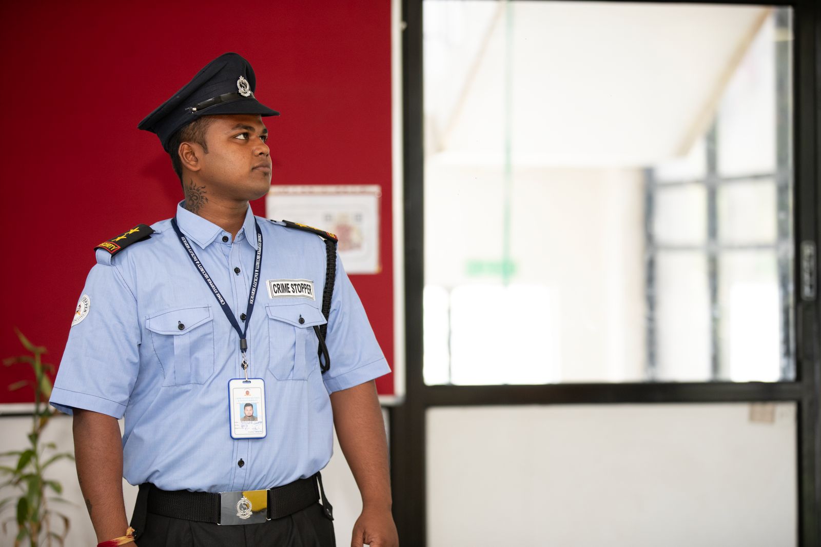 Uniformed security guard staffing a venue entrance